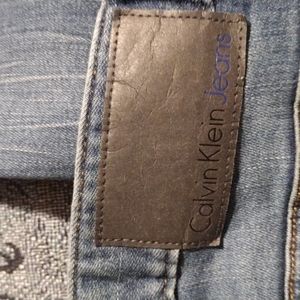 Men's Calvin Klein Jeans size 38 W / 32 L (indigo blue) slim-straight, mid rinse